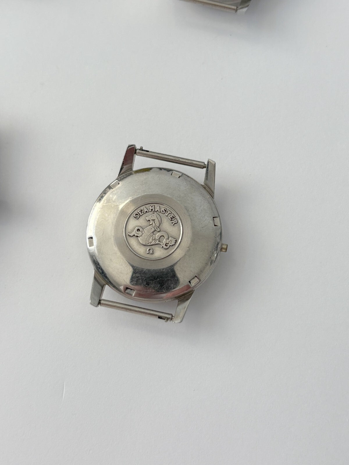 vintage Omega Seamaster cases and a diver case