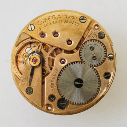 Omega Cal 268 17-jewel watch movement, gear side with brass bridges and steel wheels