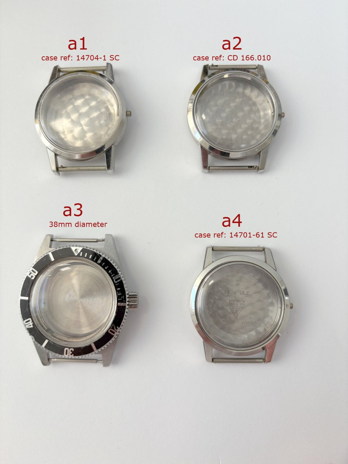 vintage Omega Seamaster cases and a diver case