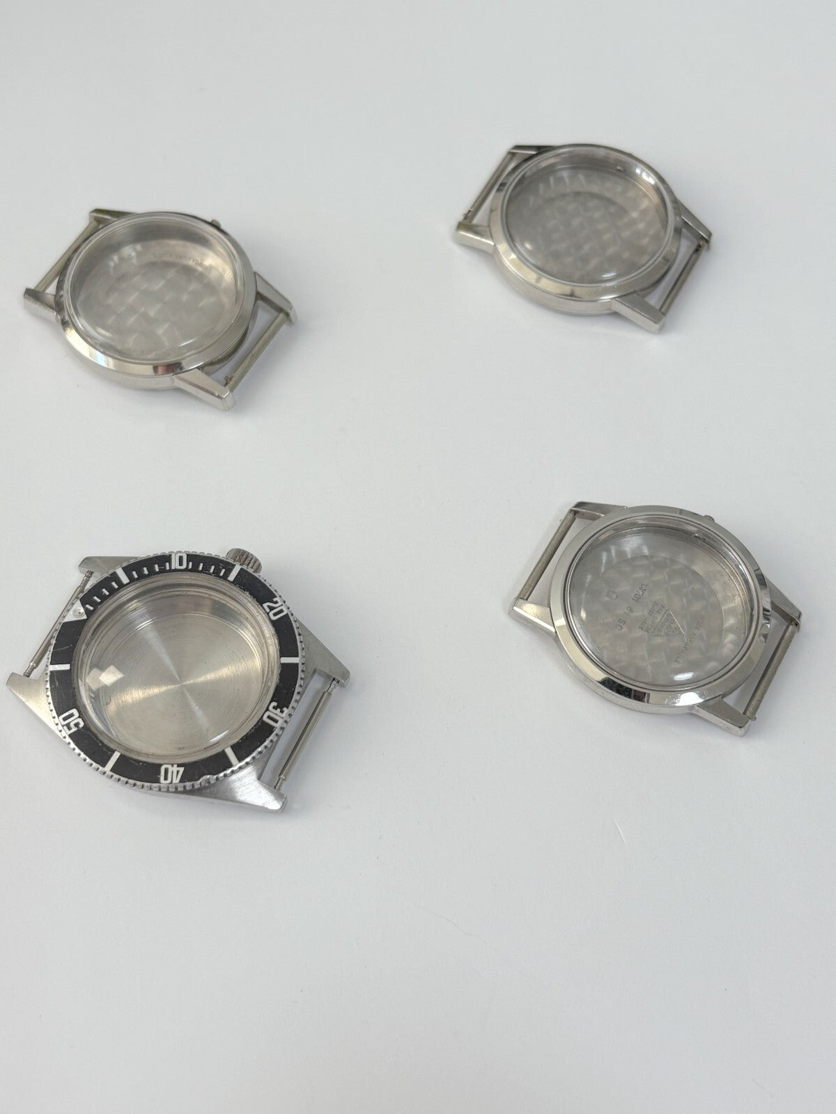 vintage Omega Seamaster cases and a diver case