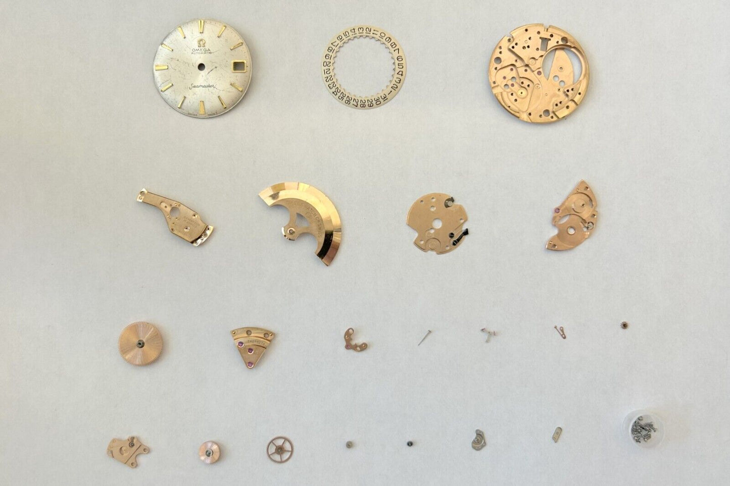 Omega Cal 563 Watch Parts Movement Dial Calendar Disk Fork Wheels Springs Bridge - Used Watch Parts