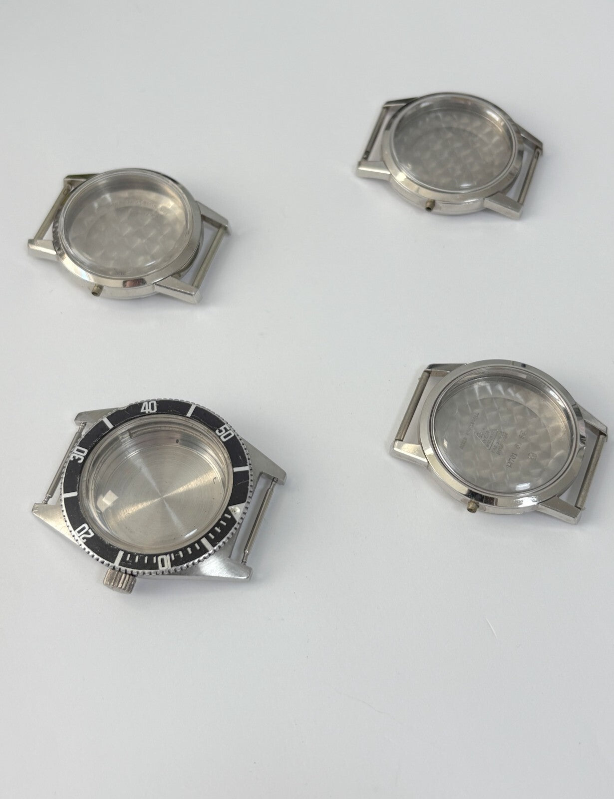 vintage Omega Seamaster cases and a diver case